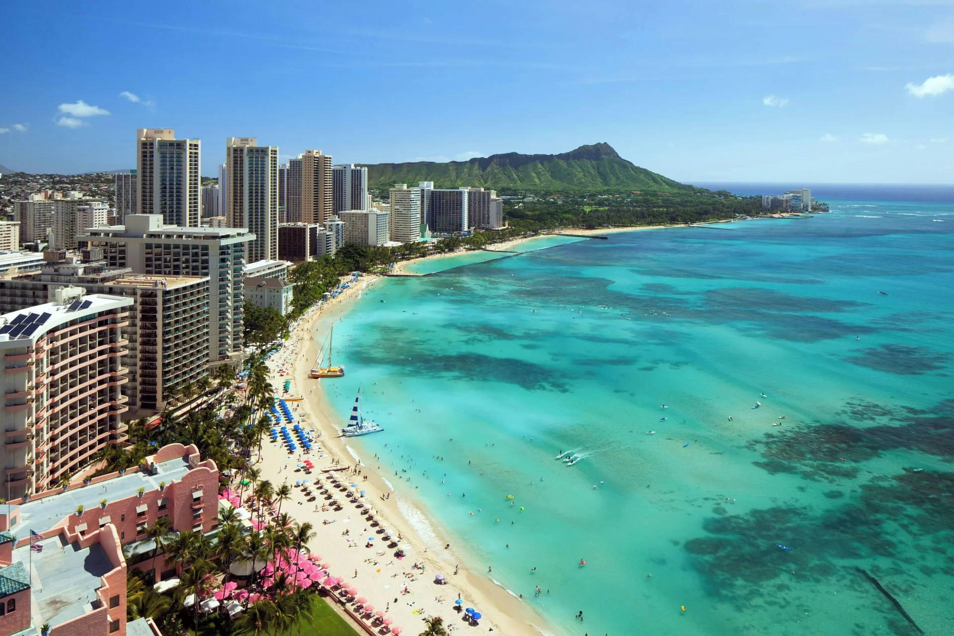 High oceanfront view of Waikiki Beach and Diamond Head at Sheraton Waikiki Beach Resort.