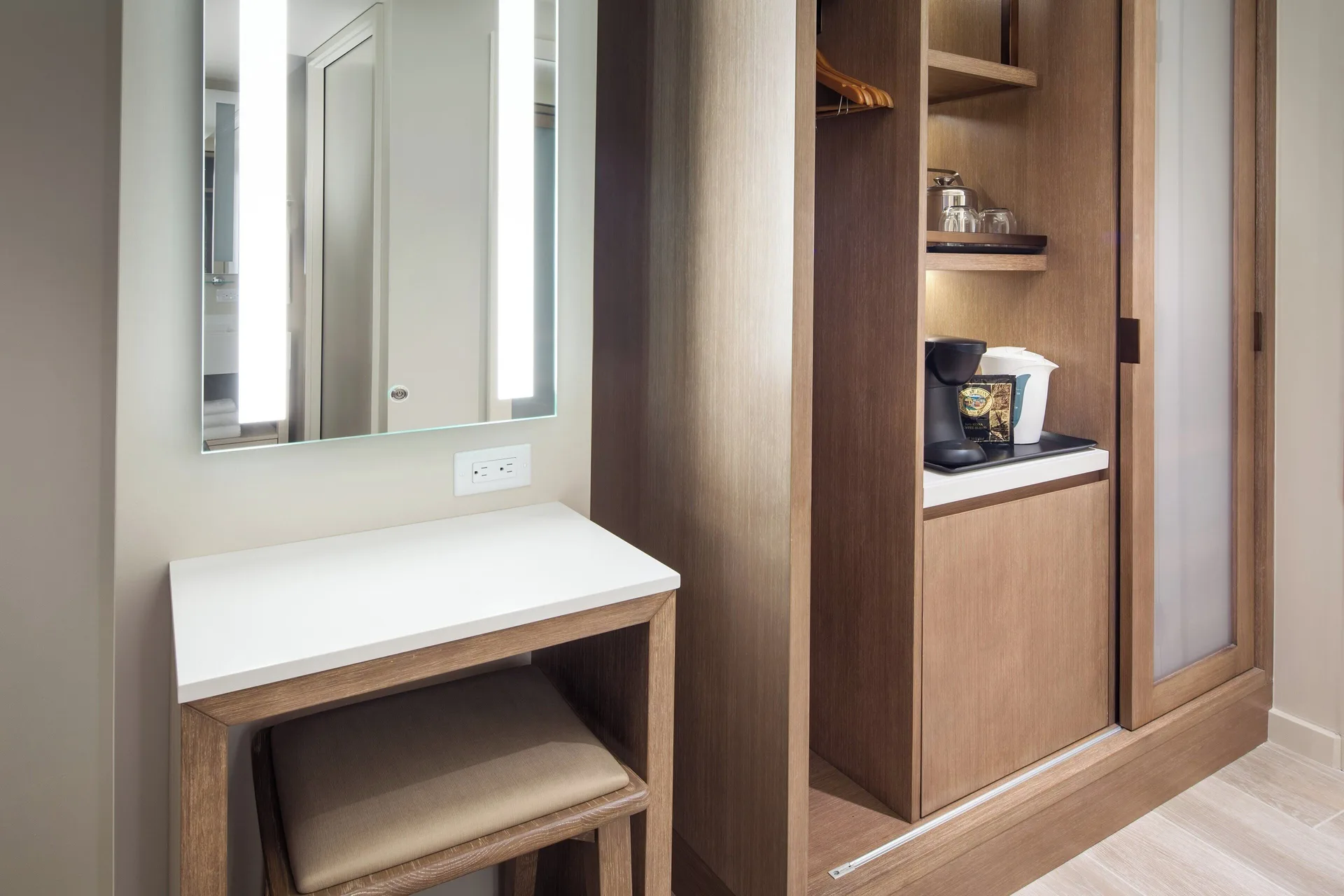 Oceanfront room vanity and closet area at Sheraton Waikiki Beach Resort.