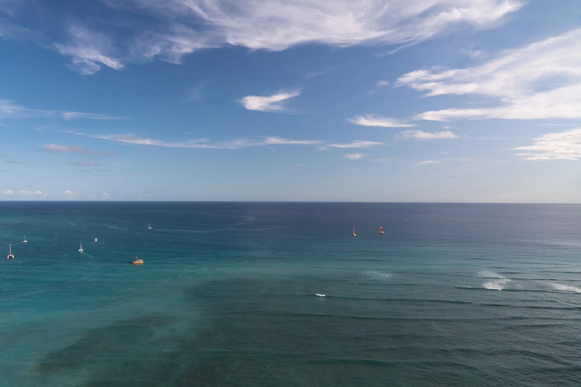 Open Pacific Ocean view from an oceanfront room at Sheraton Waikiki Beach Resort.