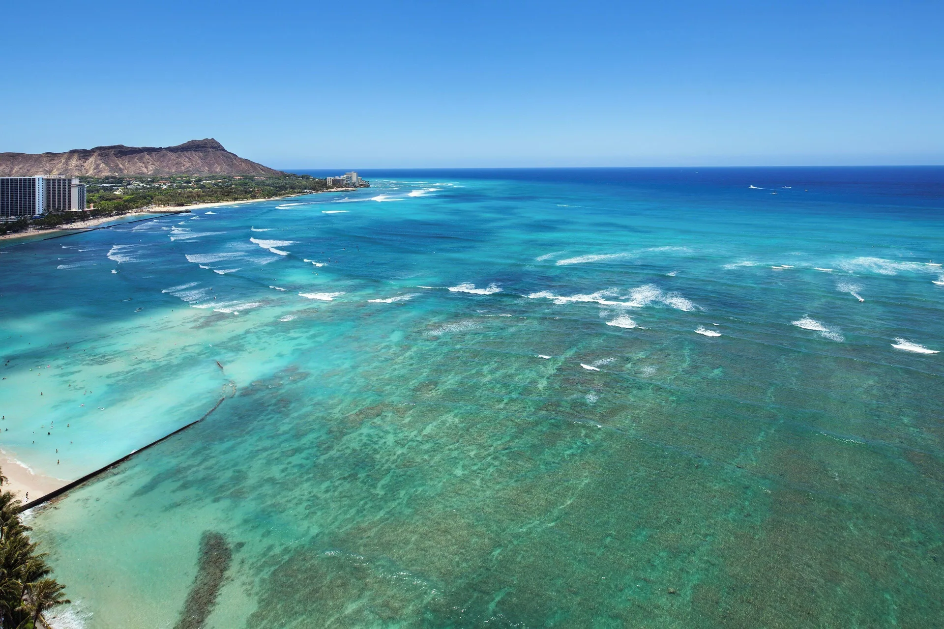 High-floor ocean view from Sheraton Waikiki Beach Resort toward Diamond Head and Waikiki Beach.
