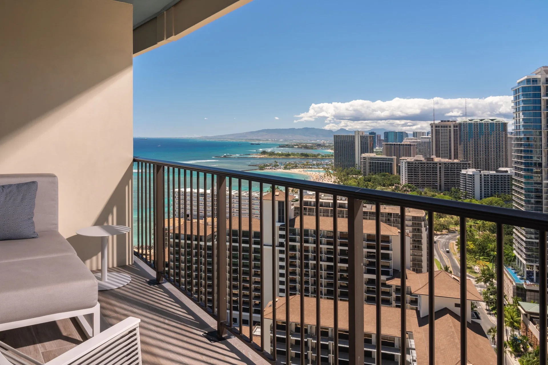Balcony view of Waikiki skyline and ocean at Sheraton Waikiki Beach Resort.