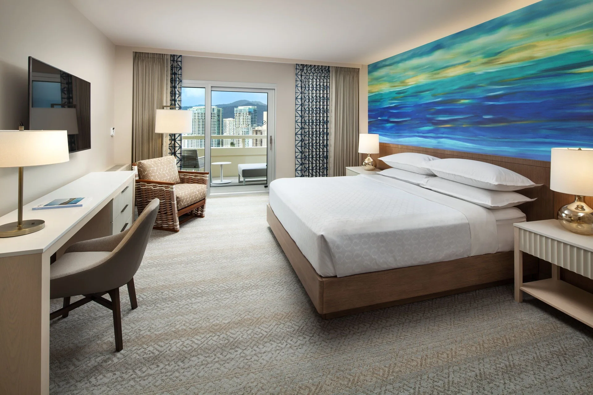 Partial Ocean View king room with balcony at Sheraton Waikiki Beach Resort.