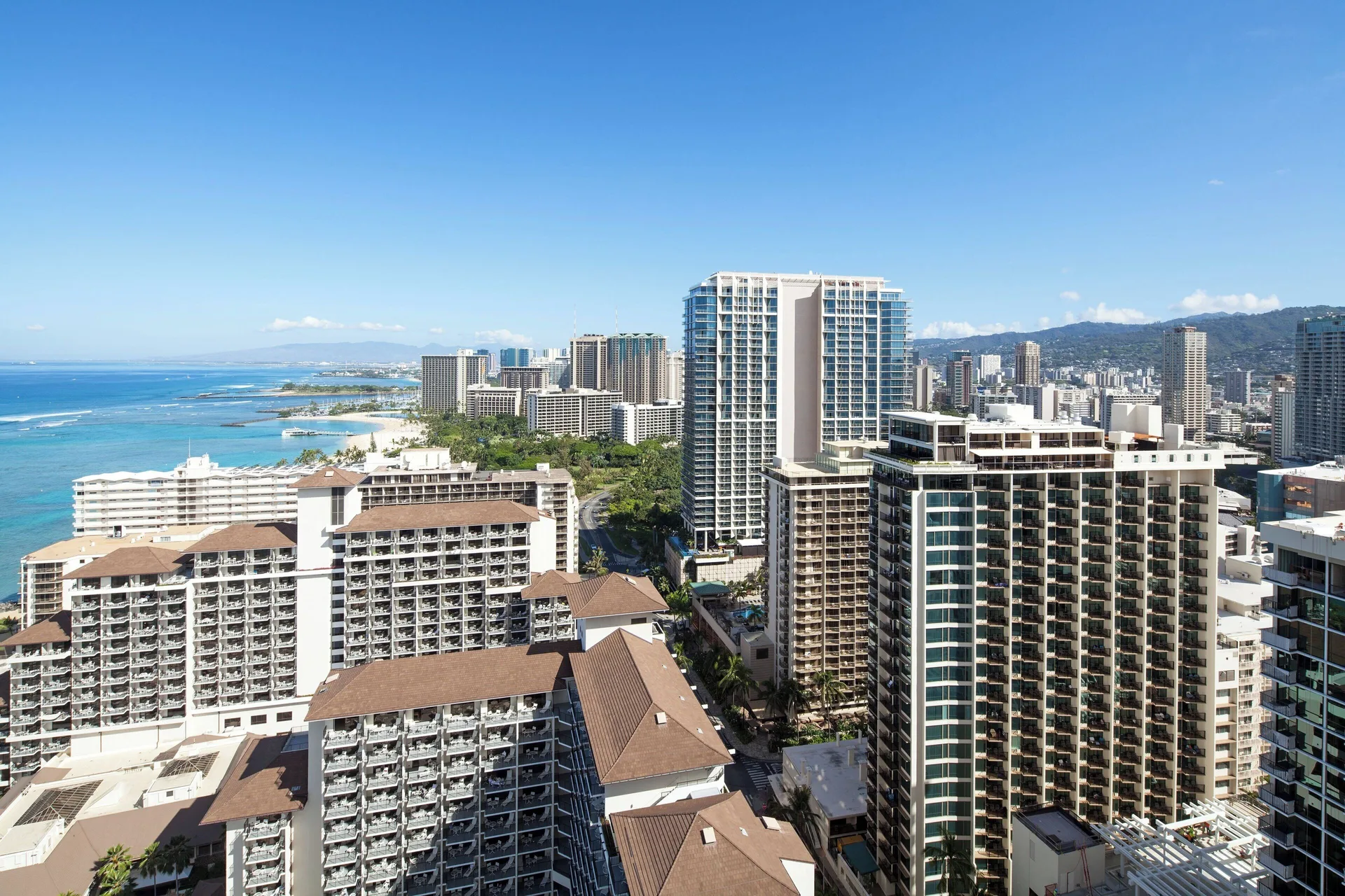 Partial ocean and Waikiki skyline view from Sheraton Waikiki Beach Resort.