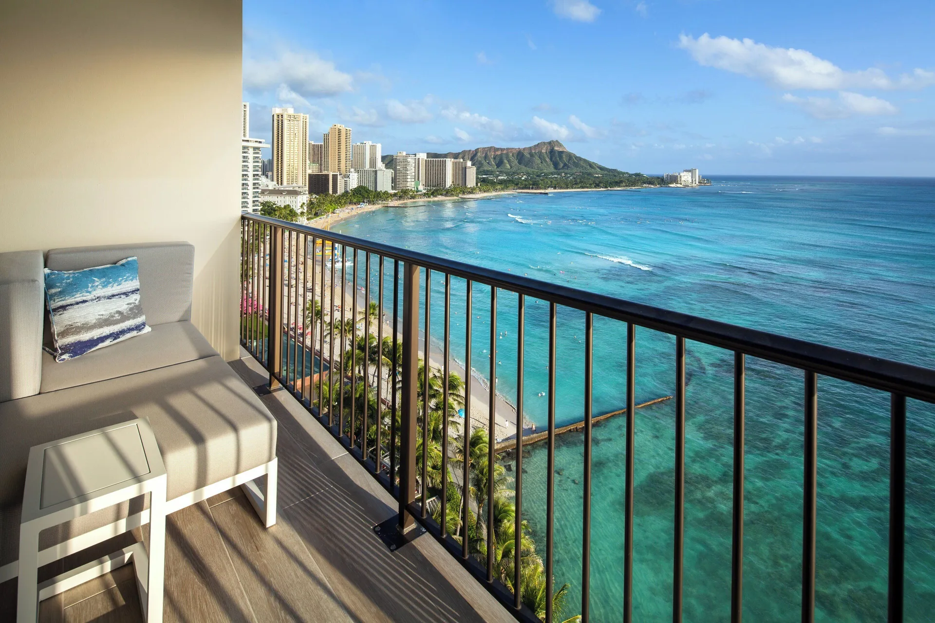 Oceanfront Kai Suite balcony with Waikiki Beach view at Sheraton Waikiki Beach Resort.
