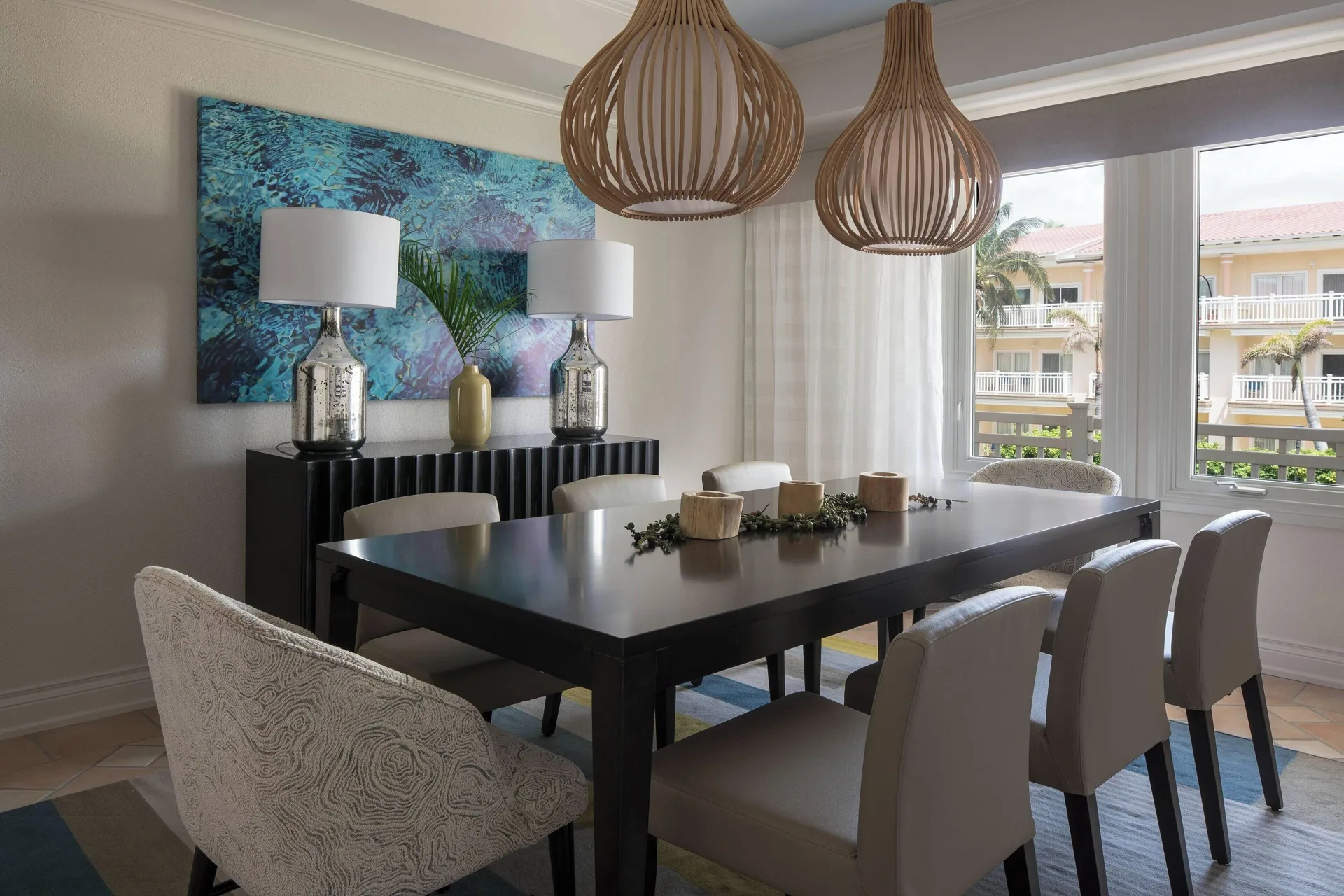 Dining area with resort-view windows in a villa at St Kitts Marriott Beach Resort, Casino & Spa.