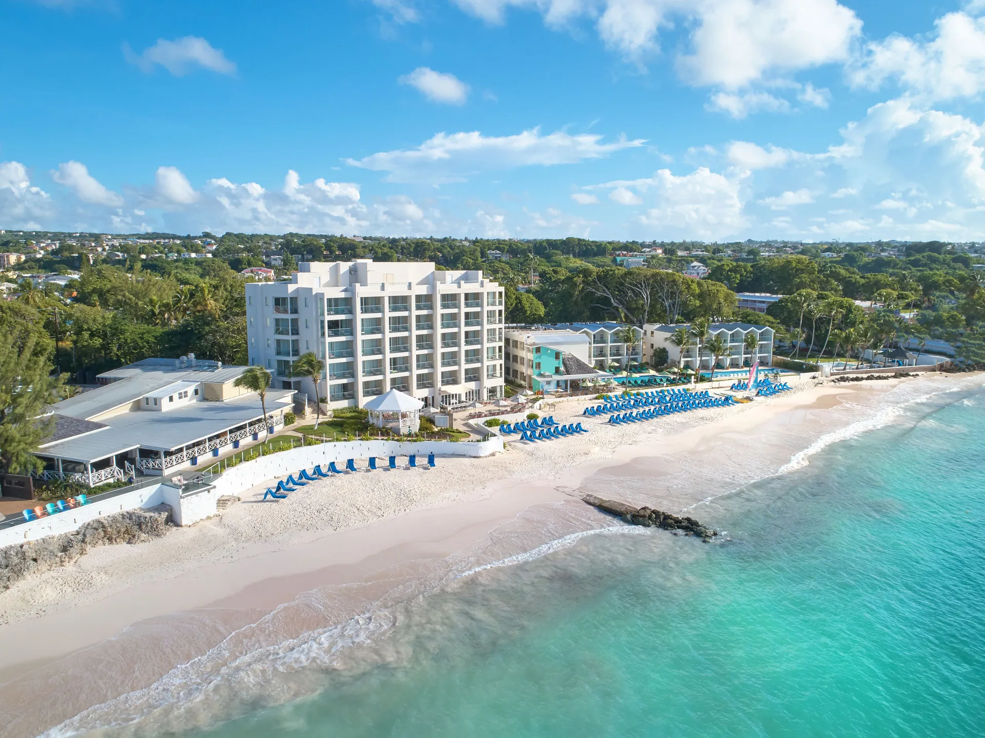 Sea Breeze Beach The House all-inclusive resort with oceanfront pools dining and relaxed beach house style