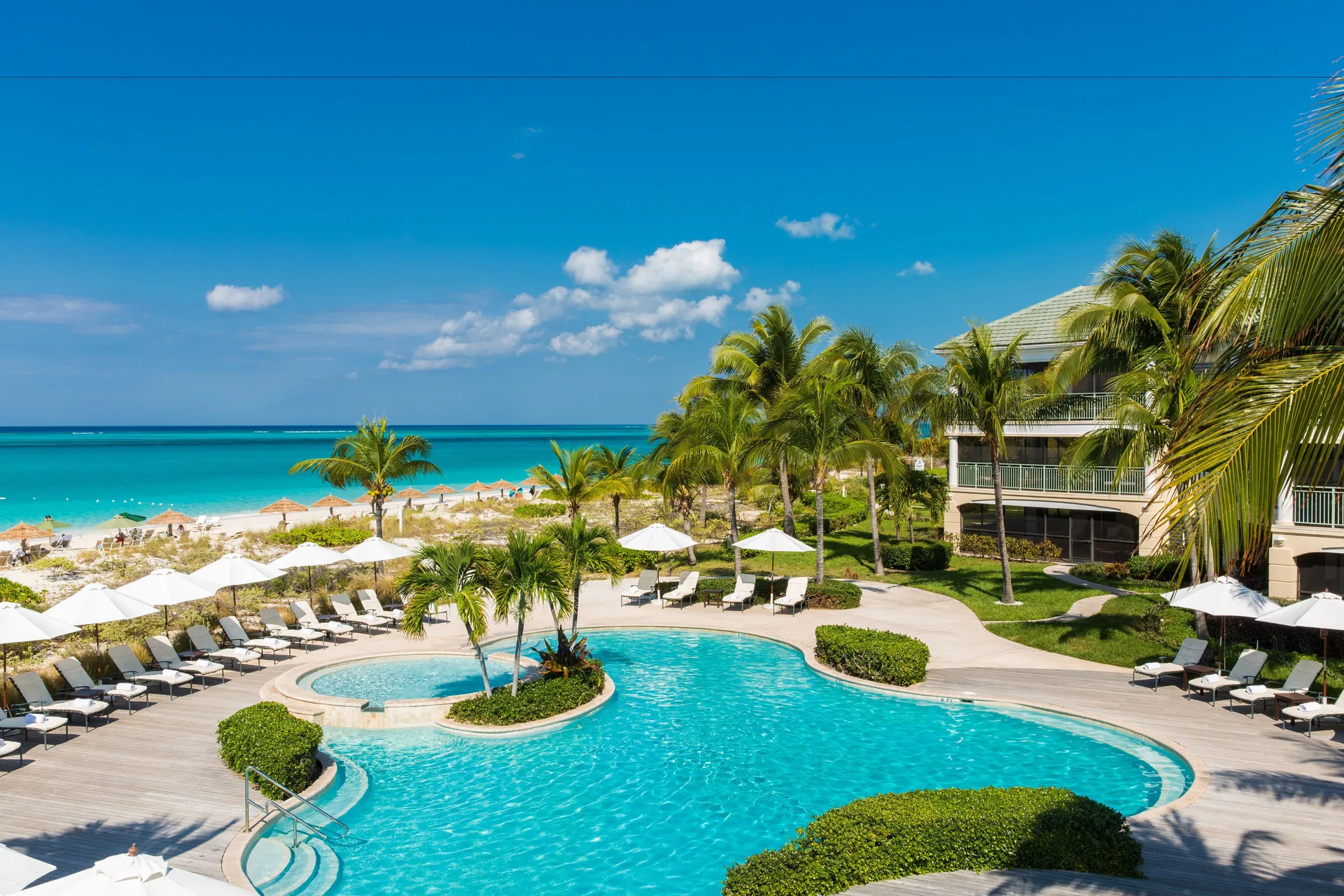 The Sands at Grace Bay family-friendly beachfront resort with suites and tropical pools