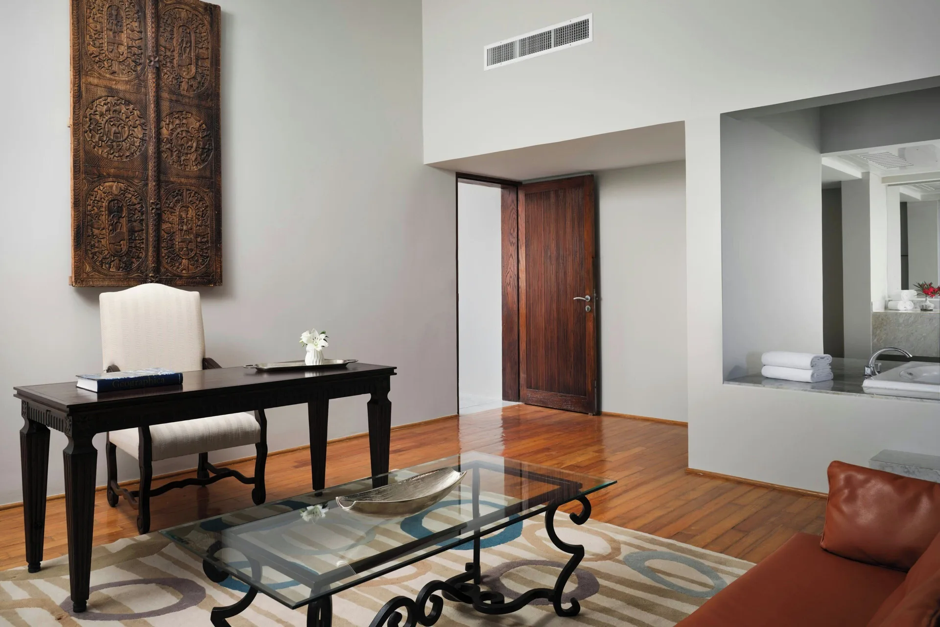 Presidential Suite living area with desk and bathroom pass-through at The Westin Resort & Spa, Cancun.