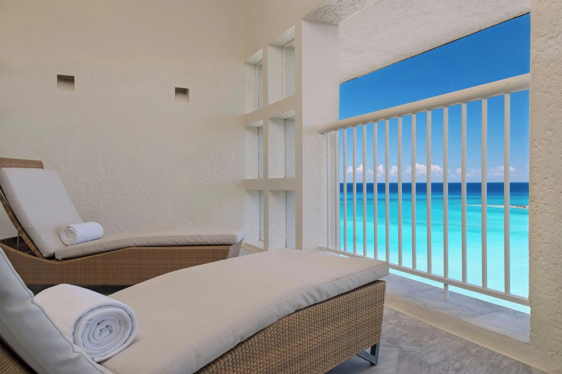 Presidential Suite balcony loungers overlooking the Caribbean at The Westin Resort & Spa, Cancun.