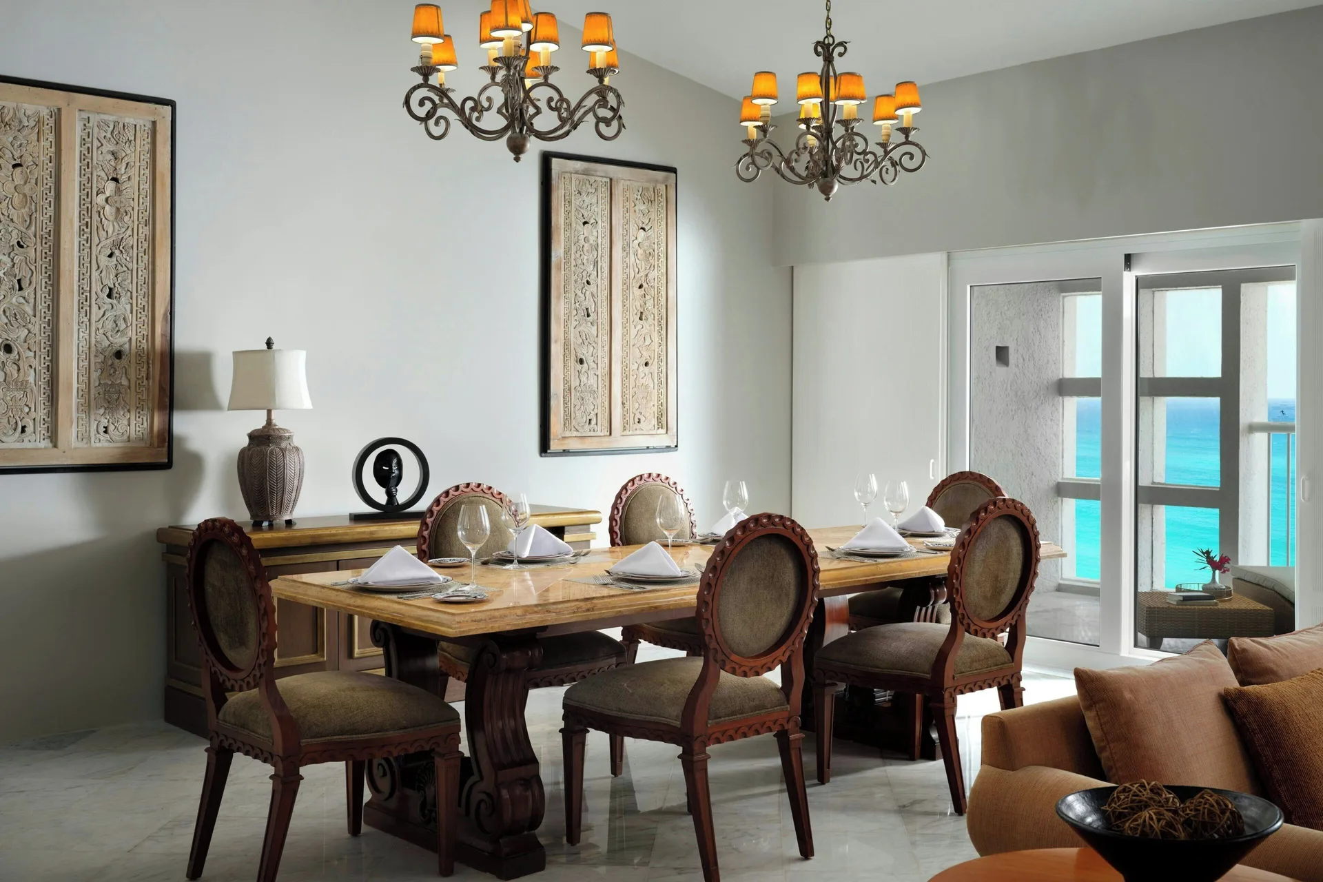 Presidential Suite dining table with balcony and ocean view at The Westin Resort & Spa, Cancun.