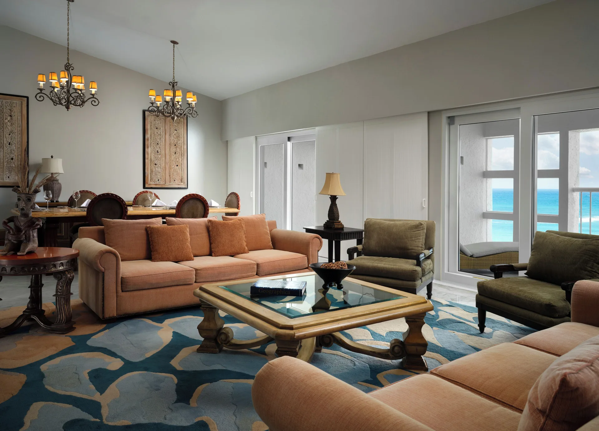 Presidential Suite living and dining room with ocean-facing balcony at The Westin Resort & Spa, Cancun.