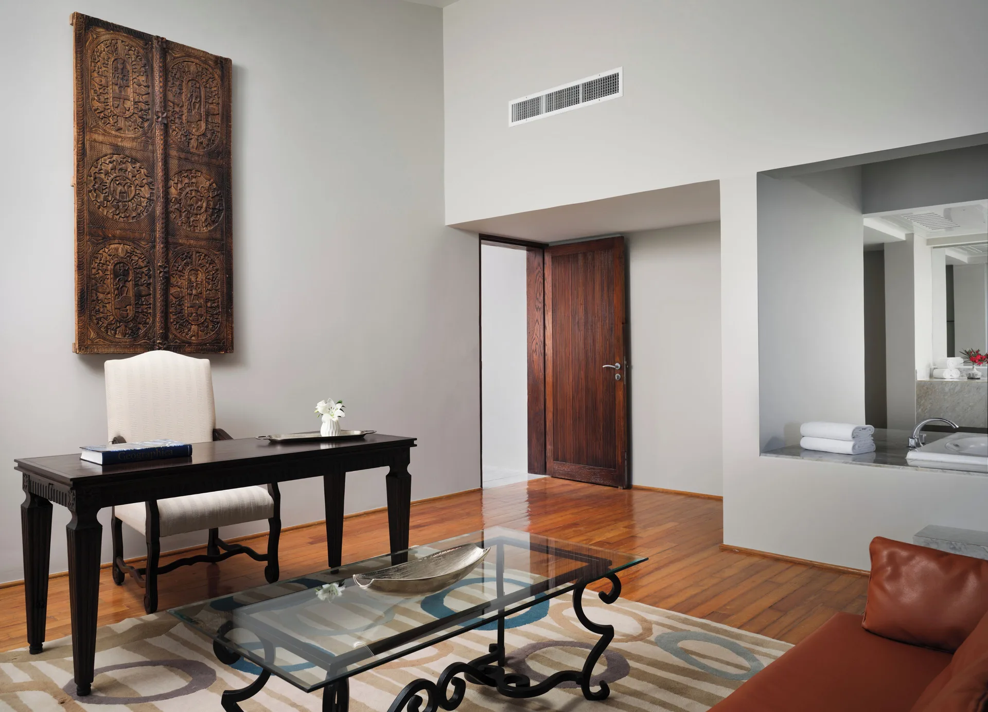 Presidential Suite sitting area with desk and bath opening at The Westin Resort & Spa, Cancun.