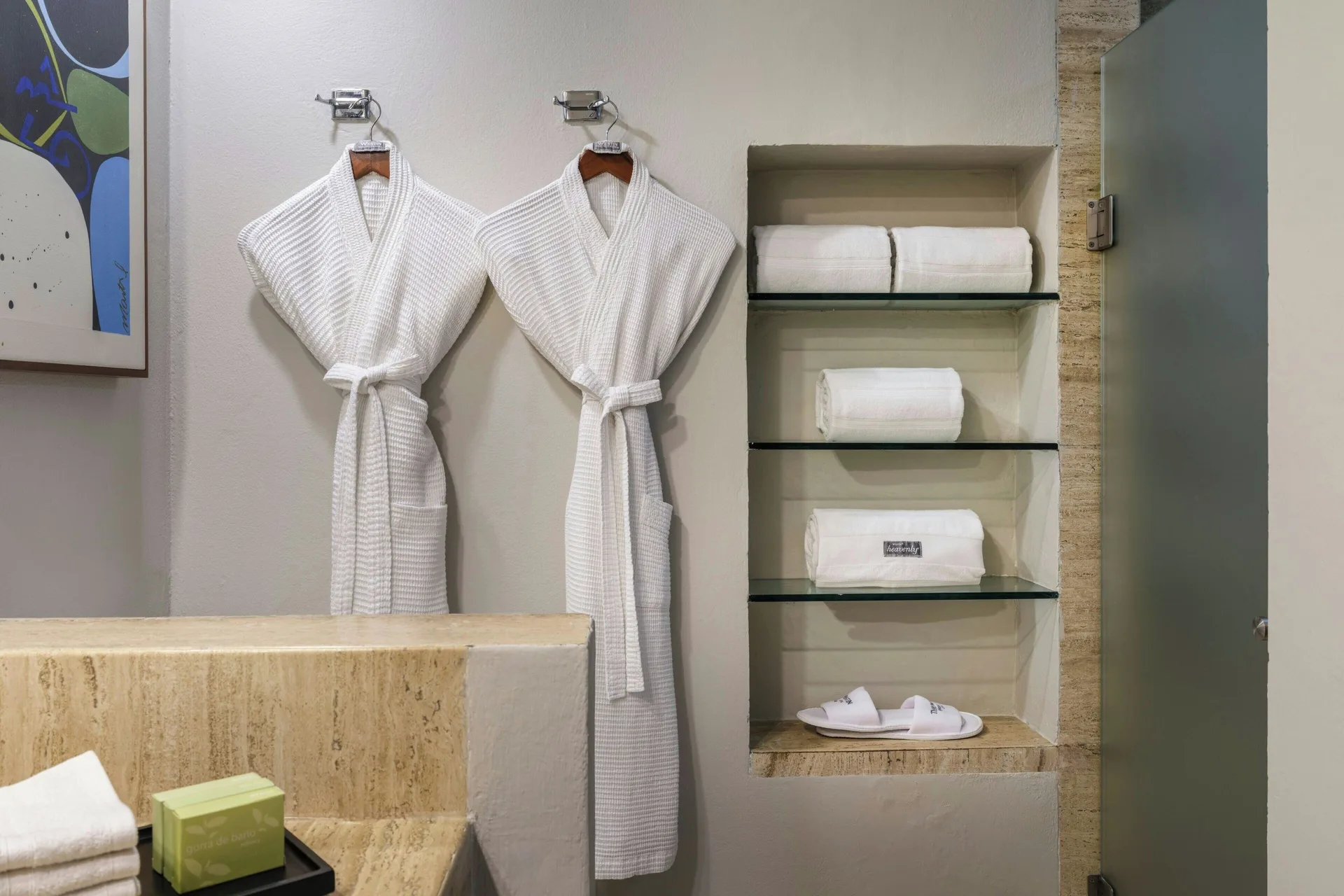 Bathroom robes, towels, and slippers in a Lagoon View room at The Westin Resort & Spa, Cancun.