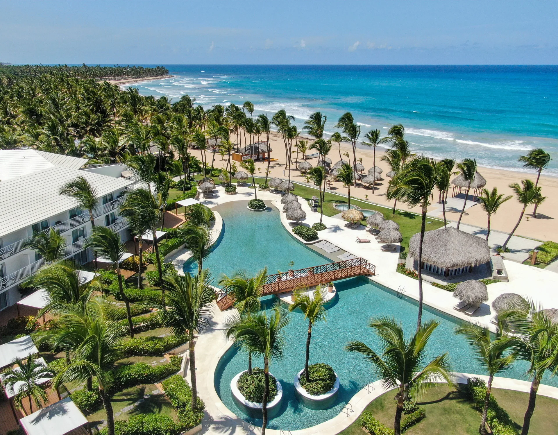 Excellence Punta Cana adults-only all-inclusive beachfront resort with tropical grounds and pools