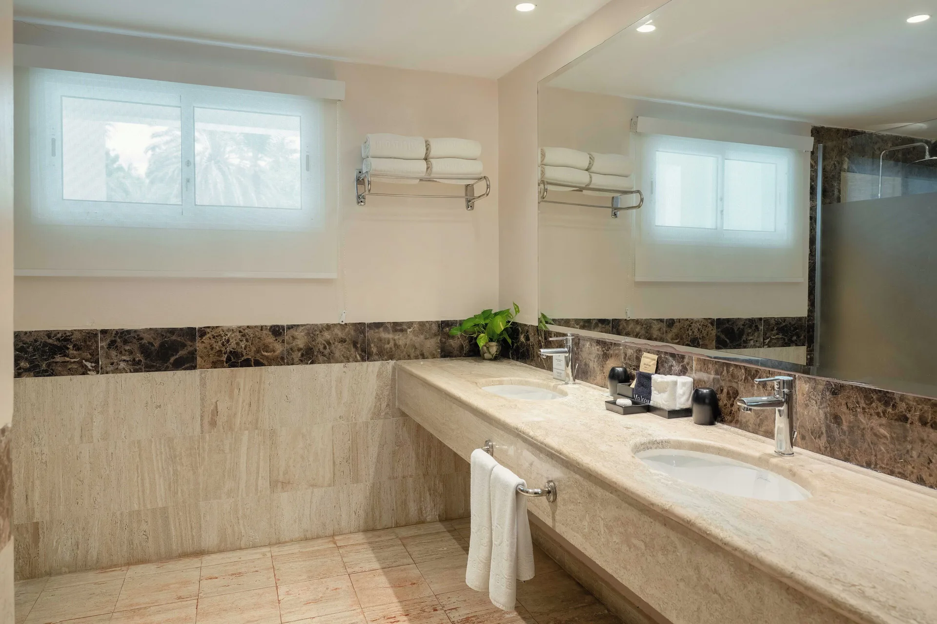 Romance Suite Swim Up bathroom with double vanity at TRS Turquesa Hotel.