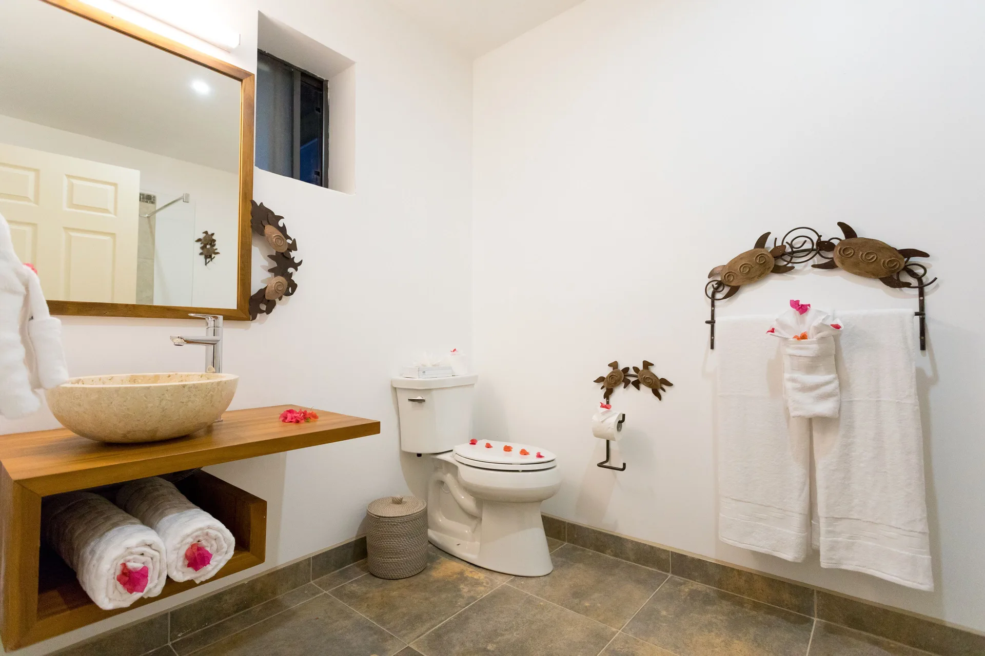 Cocoa Pod Room bathroom with vessel sink at True Blue Bay Resort.