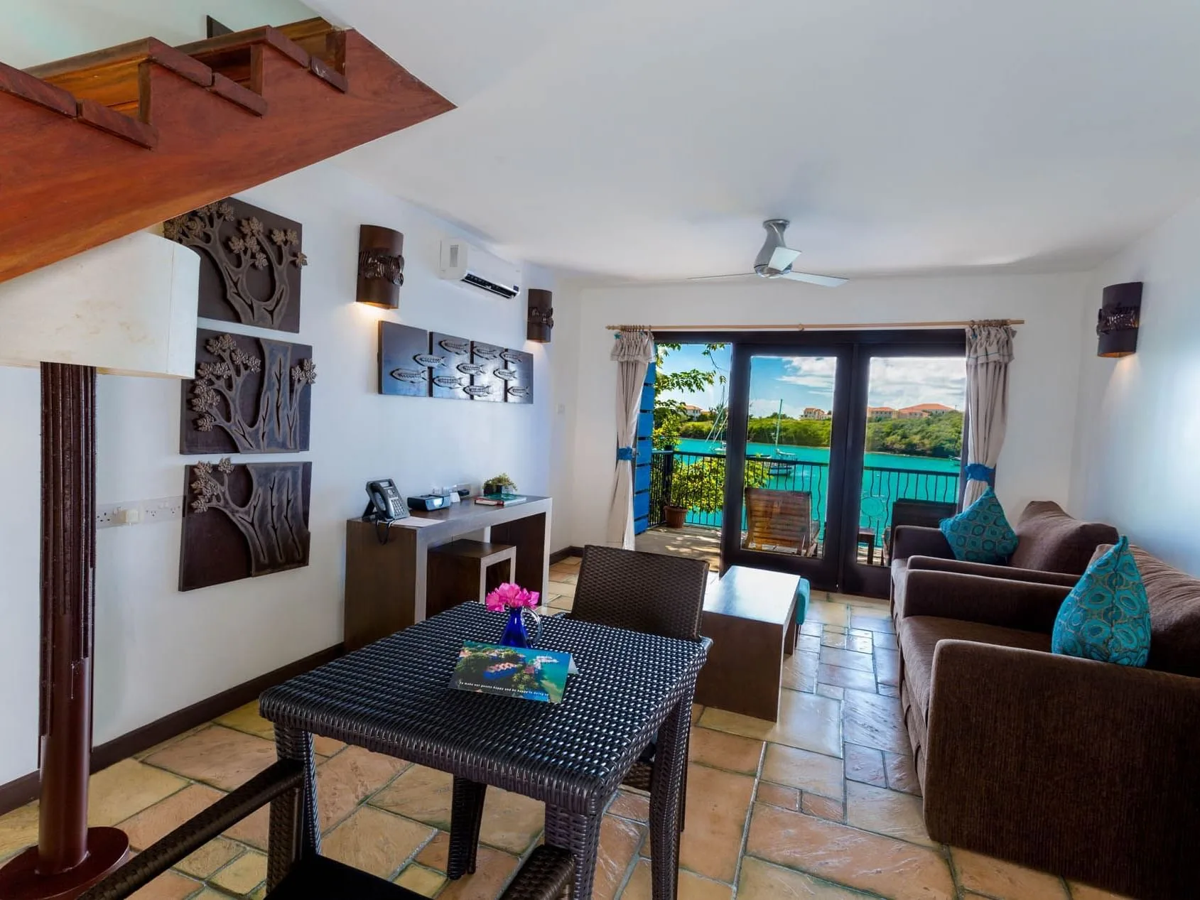 Inside the Water Front Suites at True Blue Bay Resort — from the hotel's own gallery.