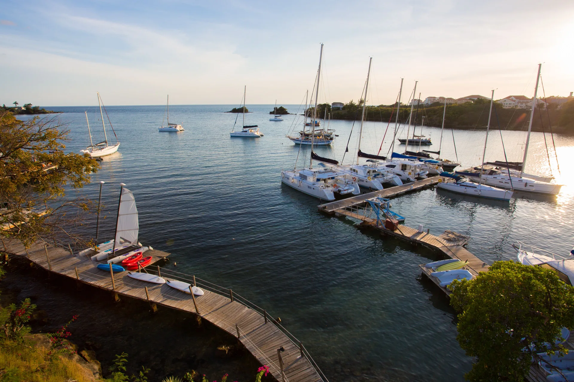 Marina view with sailboats near True Blue Bay Resort.