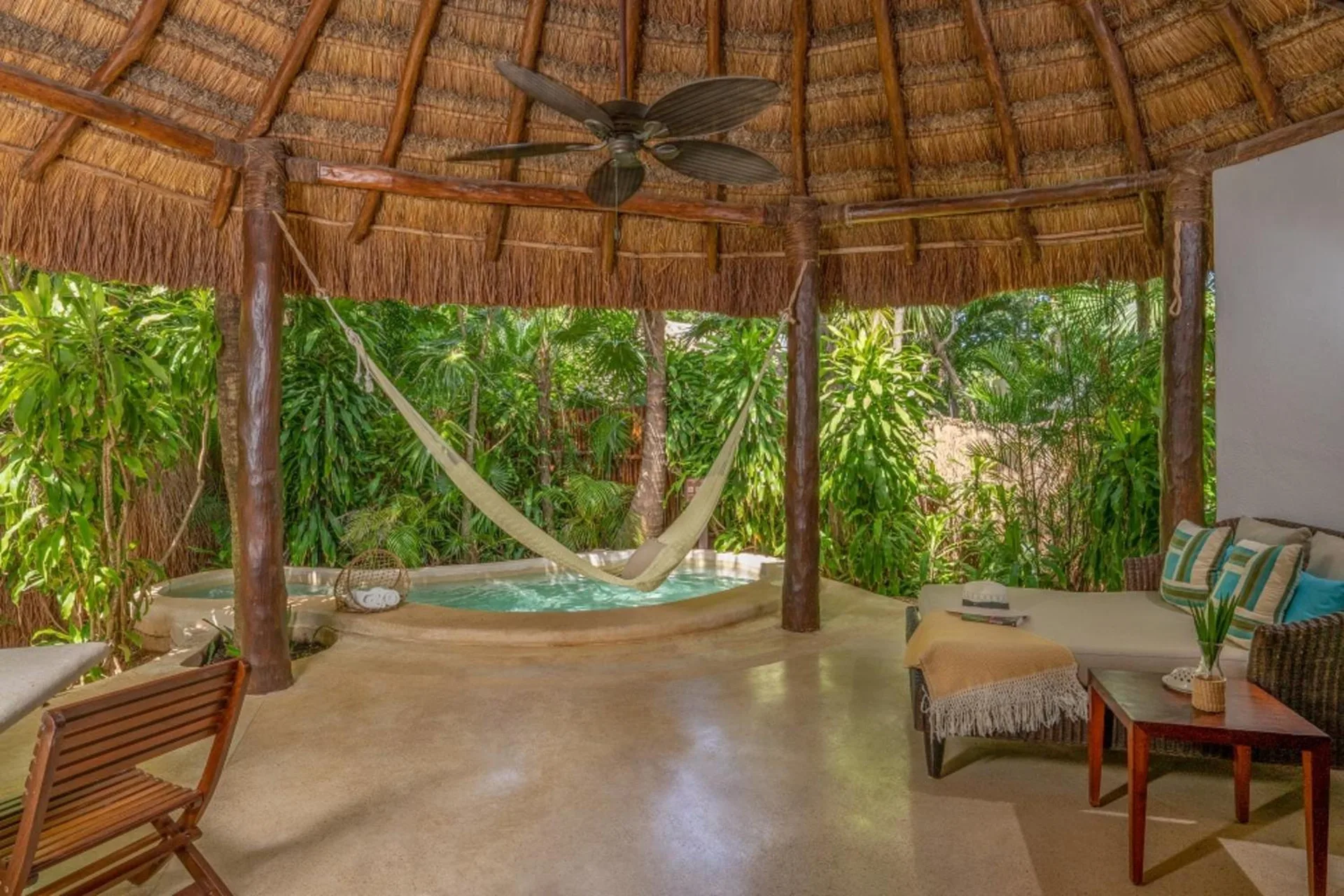 Luxury villa terrace with plunge pool and hammock at Viceroy Riviera Maya.