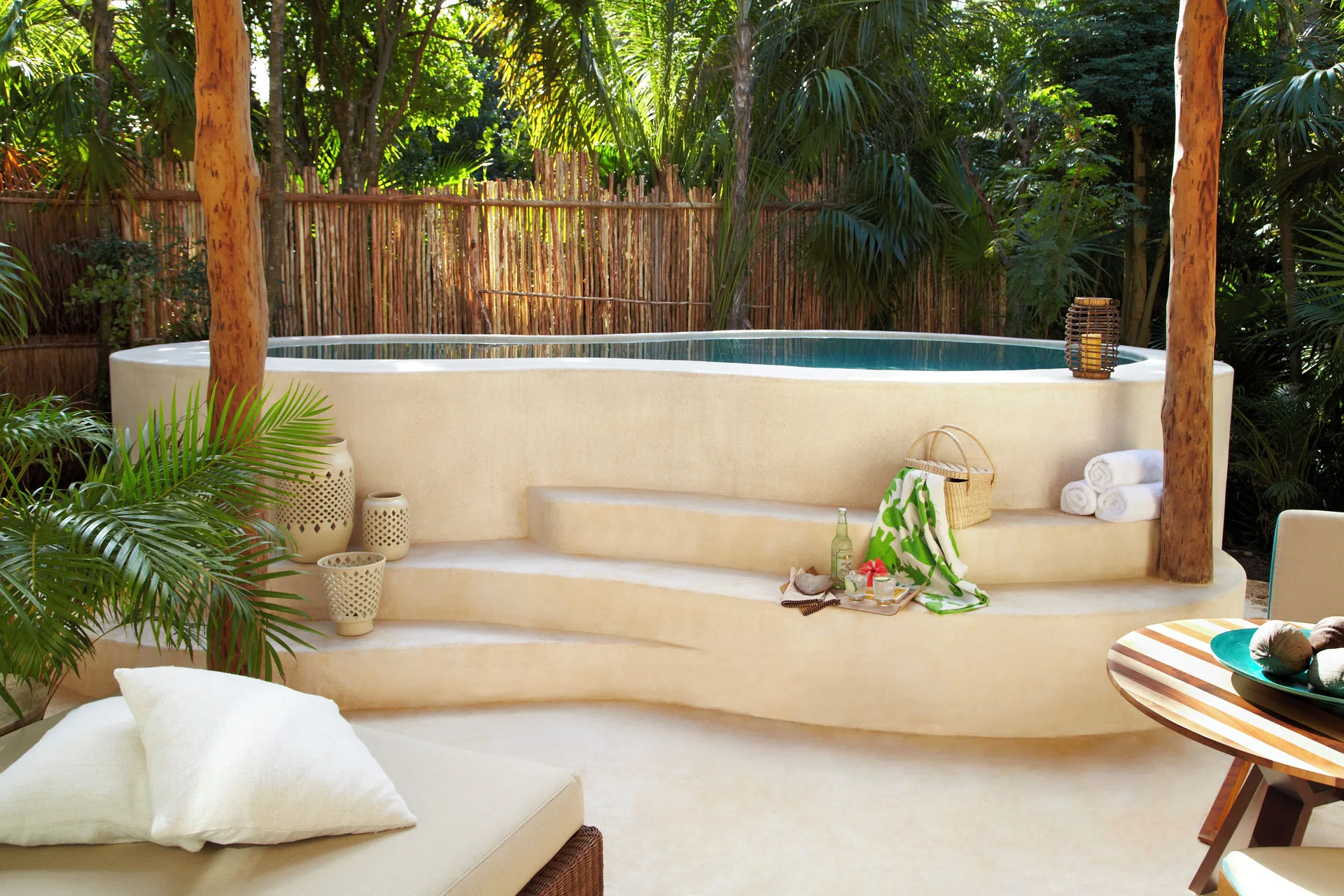 Premium Villa private plunge pool with steps and tropical greenery at Viceroy Riviera Maya.