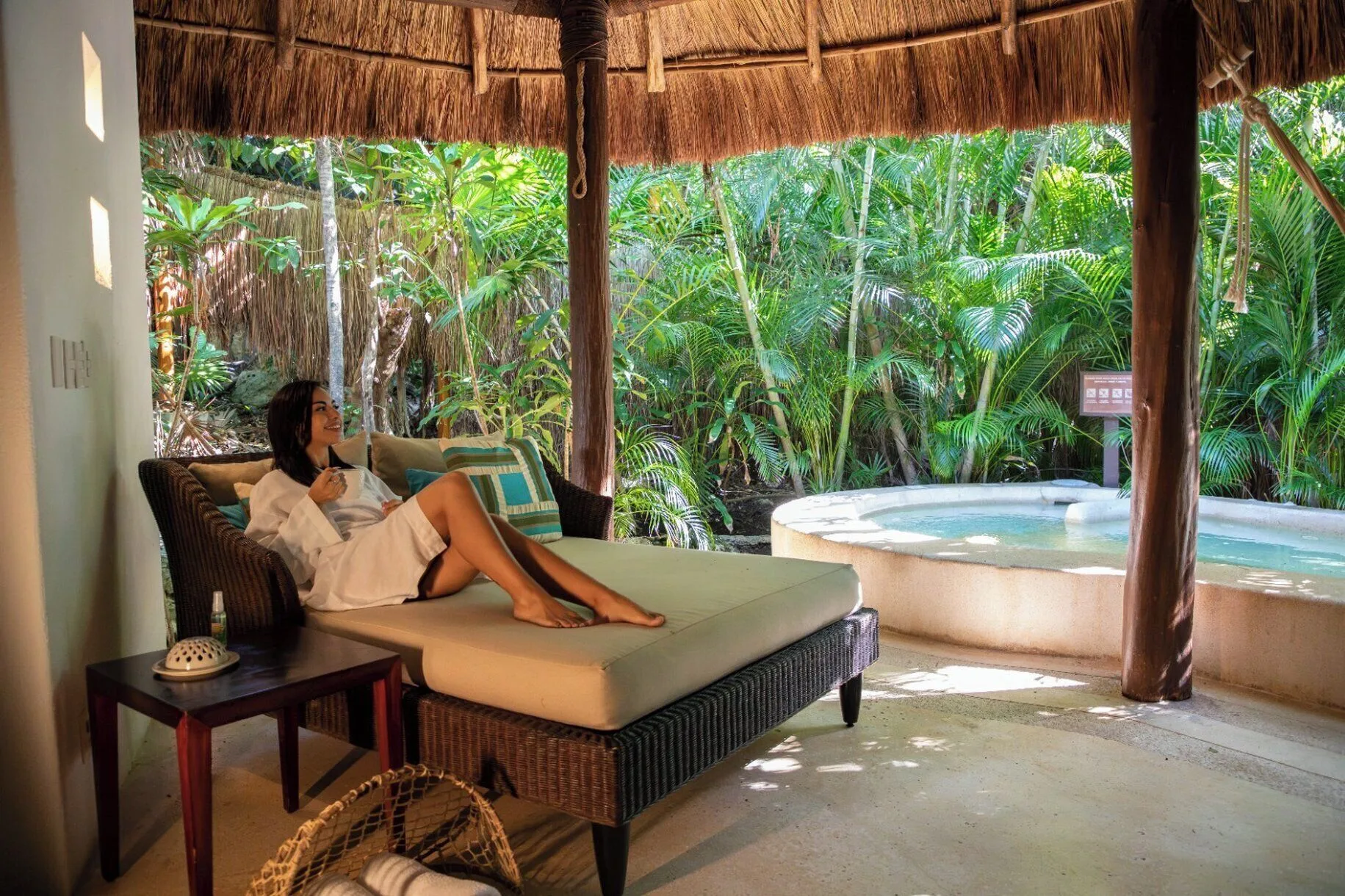 Royal Villa shaded daybed beside the plunge pool at Viceroy Riviera Maya.
