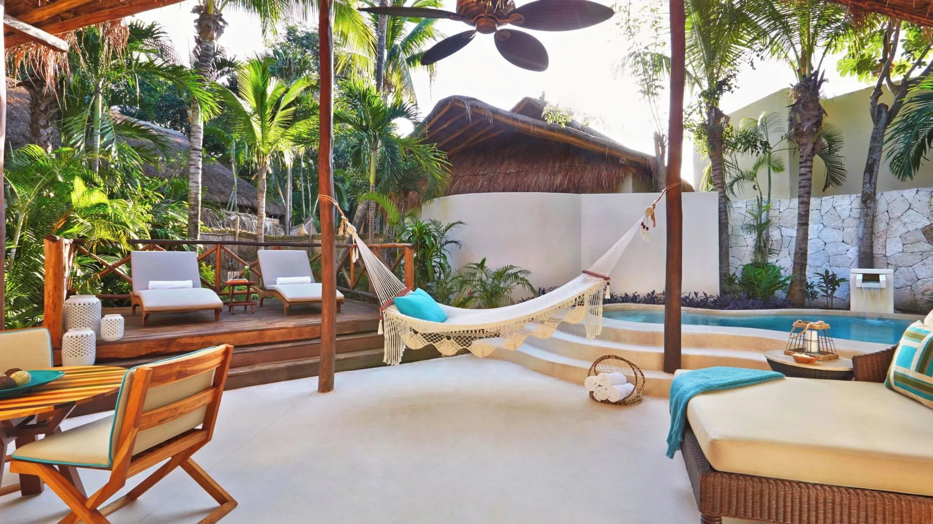 Signature Villa private deck with hammock and plunge pool at Viceroy Riviera Maya.