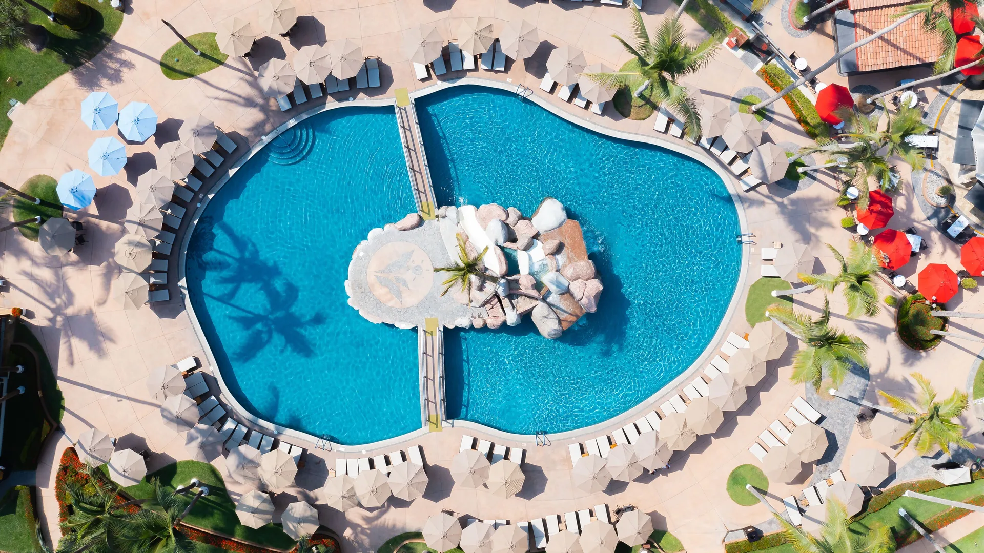 Aerial view of the twin pool layout at Villa del Palmar Beach Resort and Spa, Puerto Vallarta.