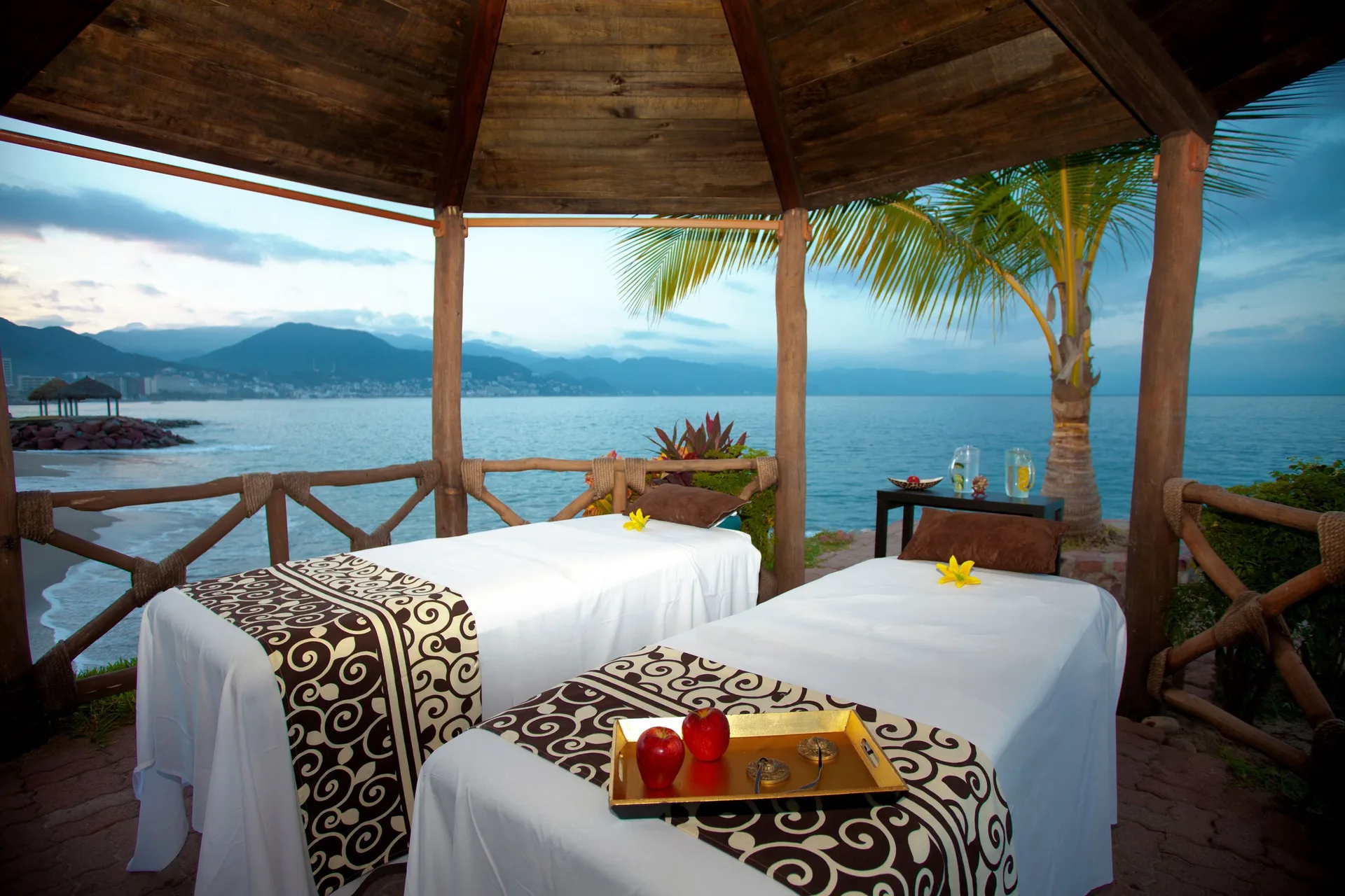 Spa tables overlooking the bay at Villa del Palmar Beach Resort and Spa, Puerto Vallarta.