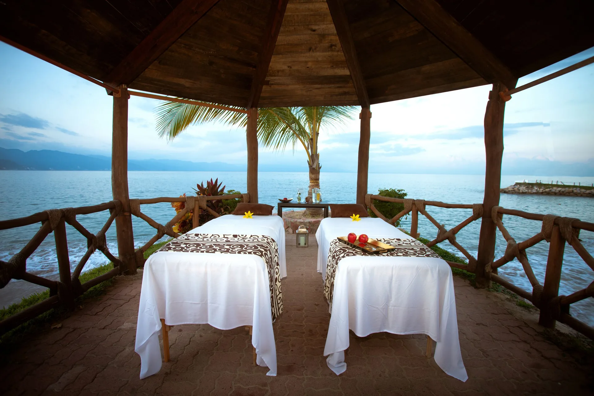 Two spa tables in a seaside gazebo at Villa del Palmar Beach Resort and Spa, Puerto Vallarta.