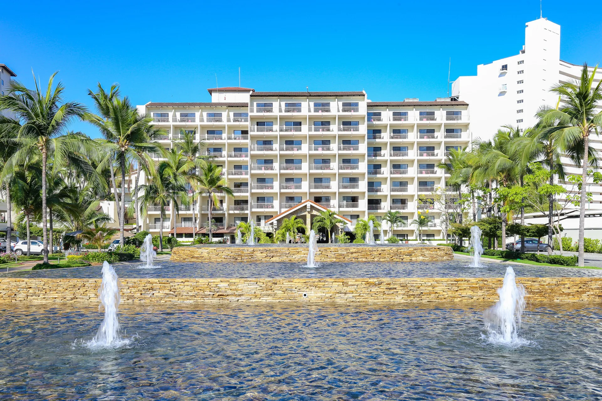 Front water feature and resort building at Villa del Palmar Beach Resort and Spa, Puerto Vallarta.