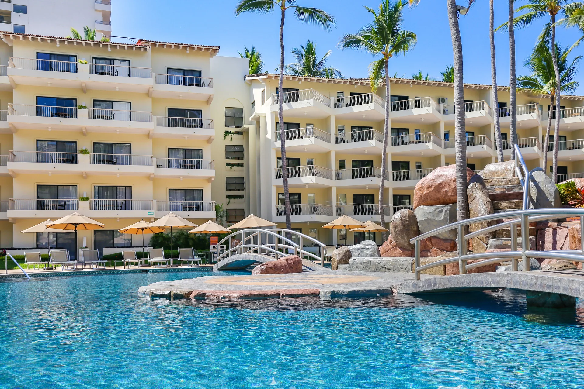 Pool bridge and balconies at Villa del Palmar Beach Resort and Spa, Puerto Vallarta.