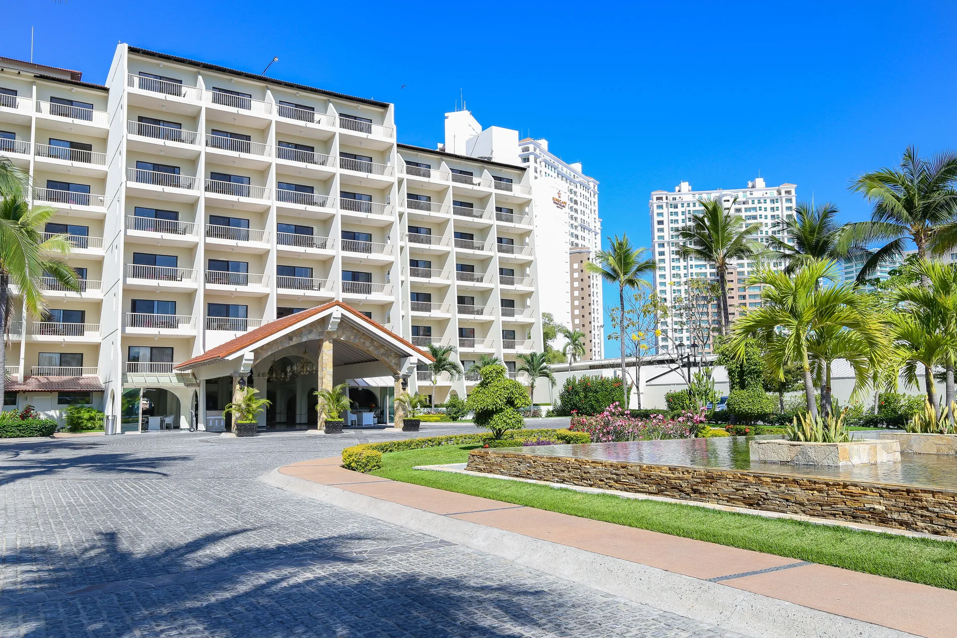 Resort entrance drive and fountain at Villa del Palmar Beach Resort and Spa, Puerto Vallarta.