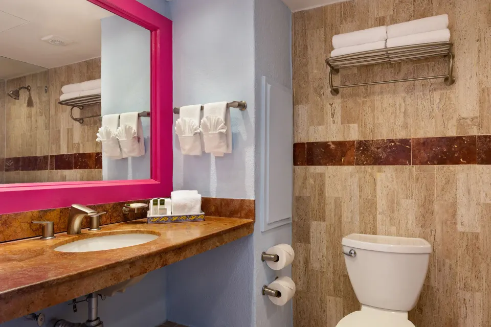 Junior Suite bathroom vanity and toilet at Villa del Palmar Beach Resort and Spa, Puerto Vallarta.