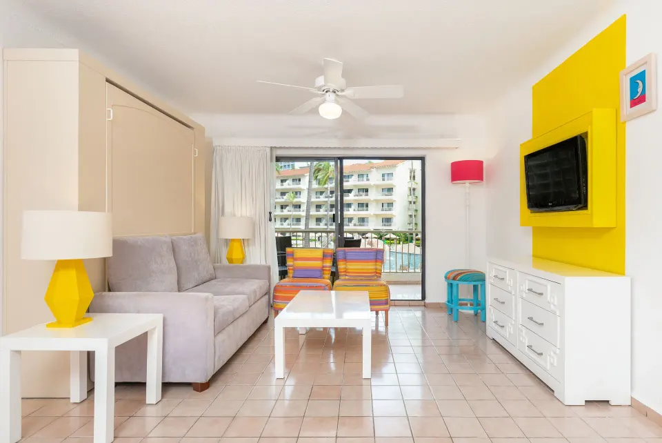 Superior Two Bedroom Suite lounge with balcony at Villa del Palmar Beach Resort and Spa, Puerto Vallarta.