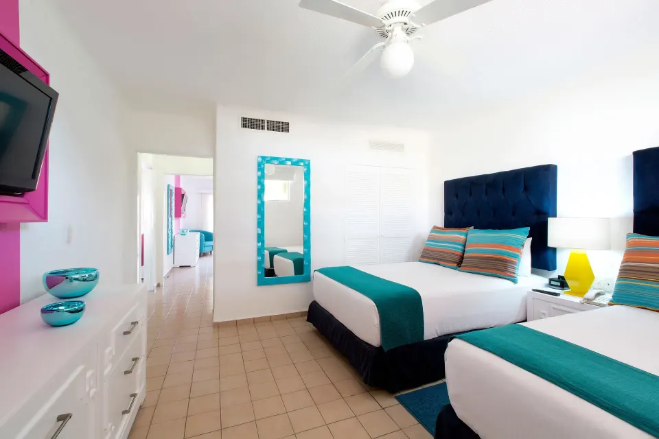 Superior Two Bedroom Suite bedroom with two beds at Villa del Palmar Beach Resort and Spa, Puerto Vallarta.
