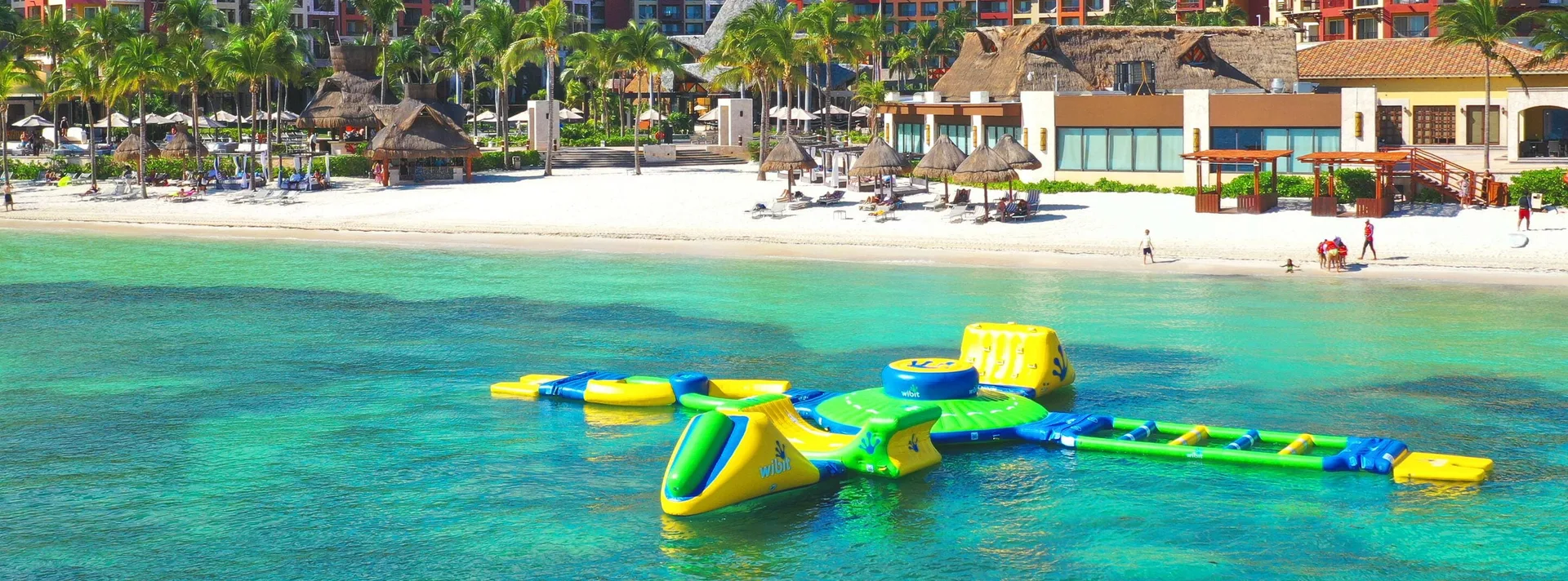 Floating water park off the beach at Villa del Palmar Cancun Beach Resort & Spa.