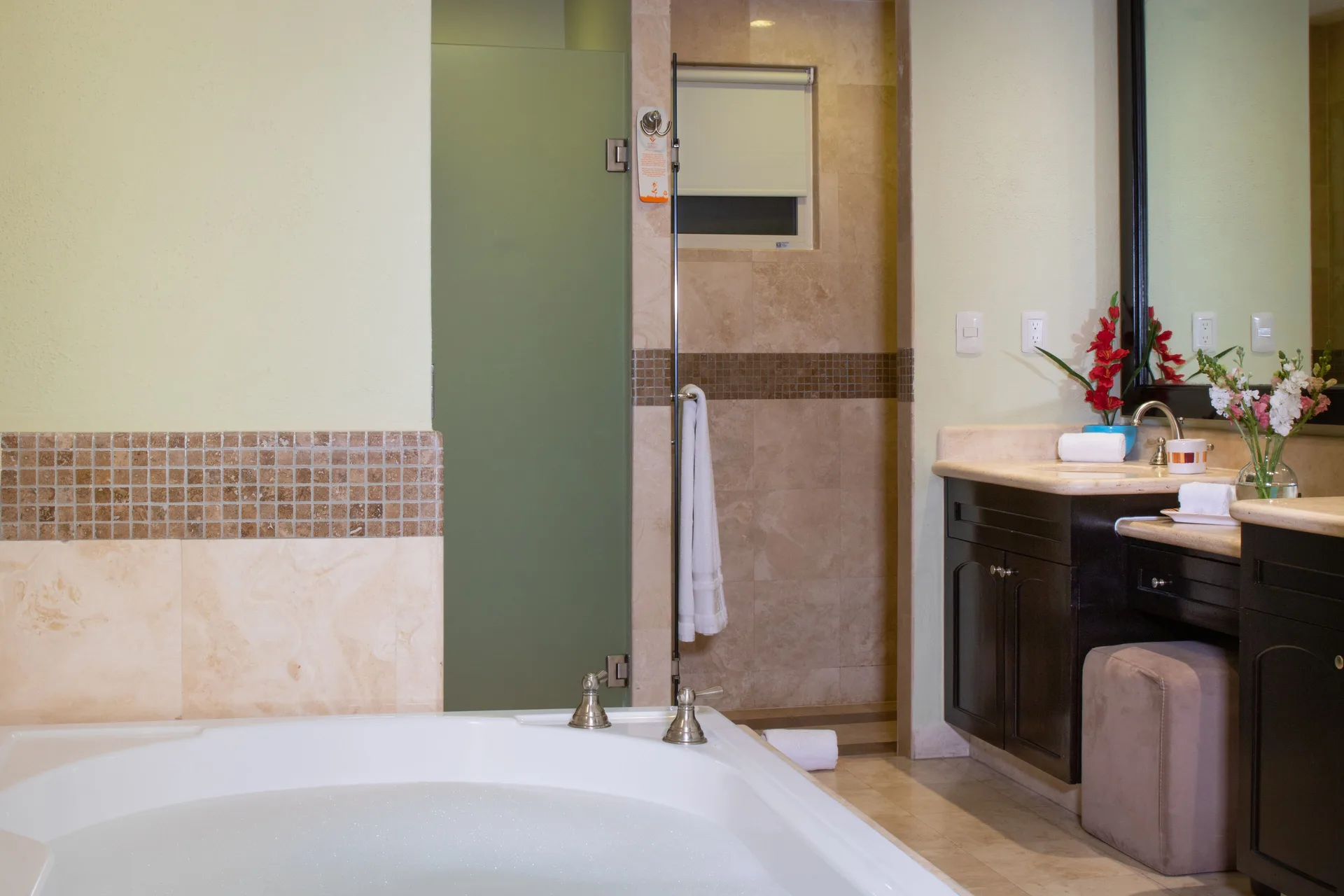 Deluxe room bathroom with soaking tub and vanity at Villa del Palmar Cancun Beach Resort & Spa.