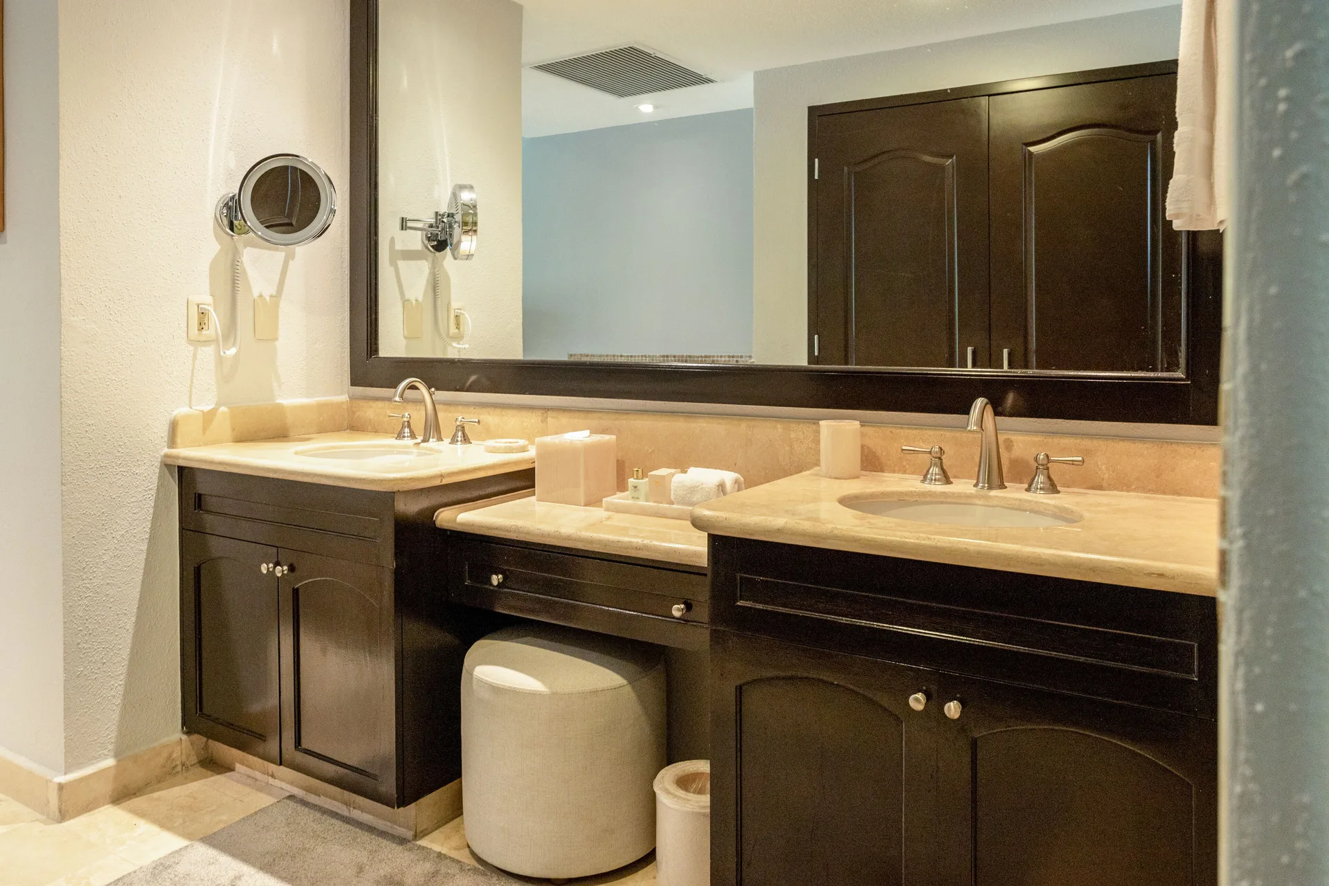 One Bedroom bathroom double vanity with large mirror at Villa del Palmar Cancun Beach Resort & Spa.