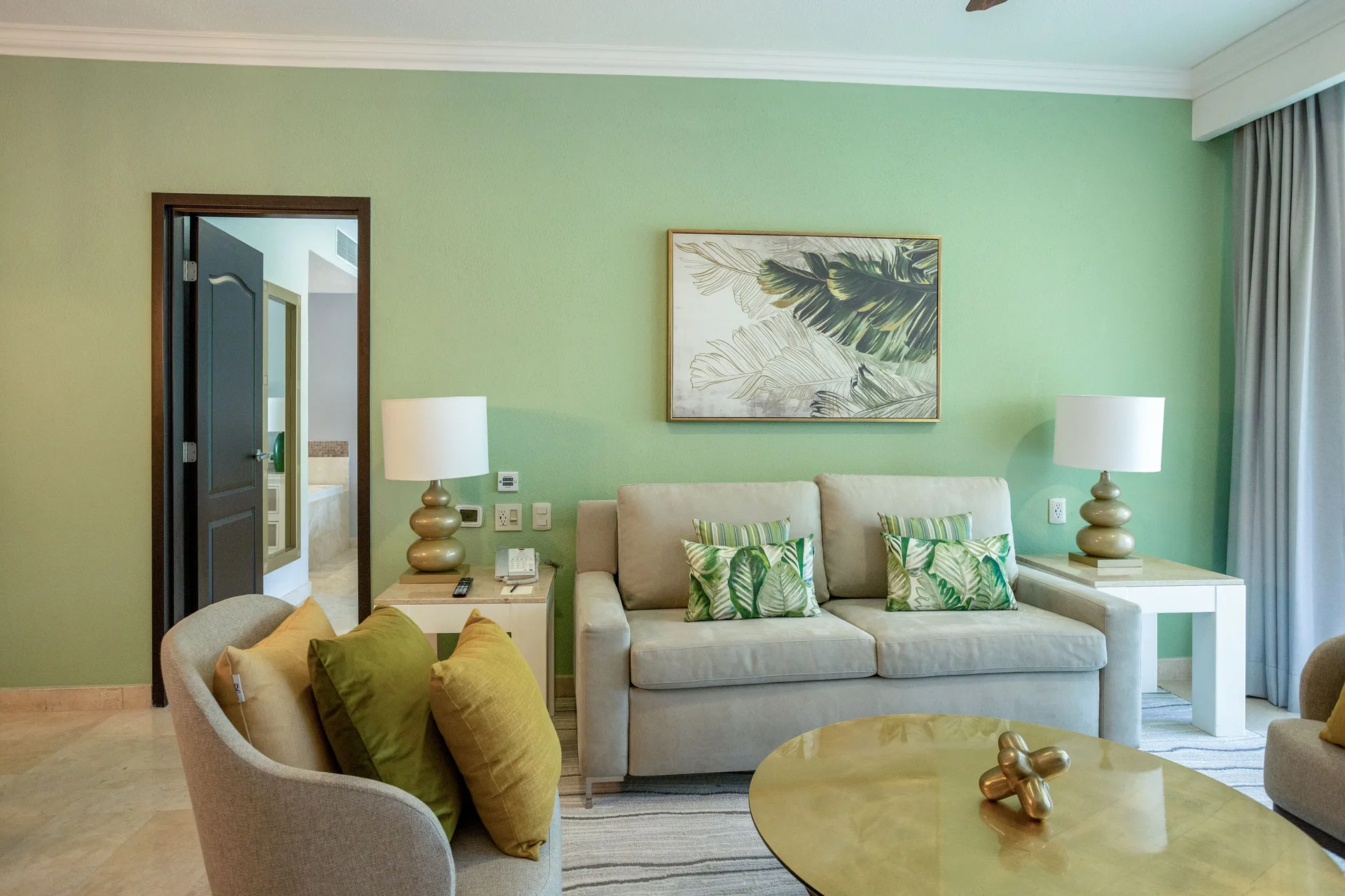 One Bedroom suite sofa seating area at Villa del Palmar Cancun Beach Resort & Spa.
