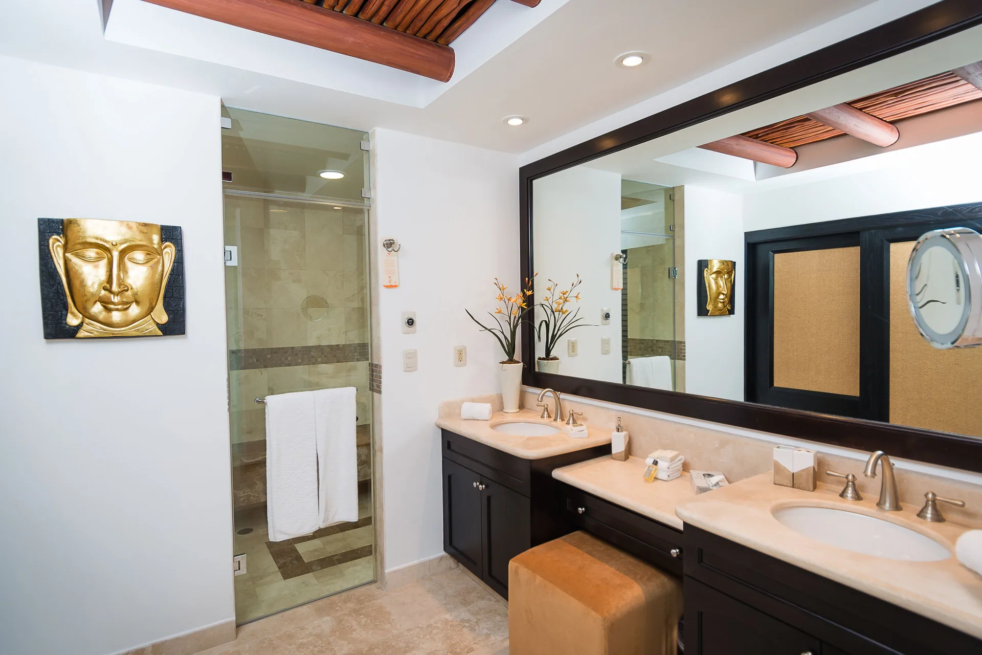 Two Bedroom Loft bathroom with double vanity and glass shower at Villa del Palmar Cancun Beach Resort & Spa.