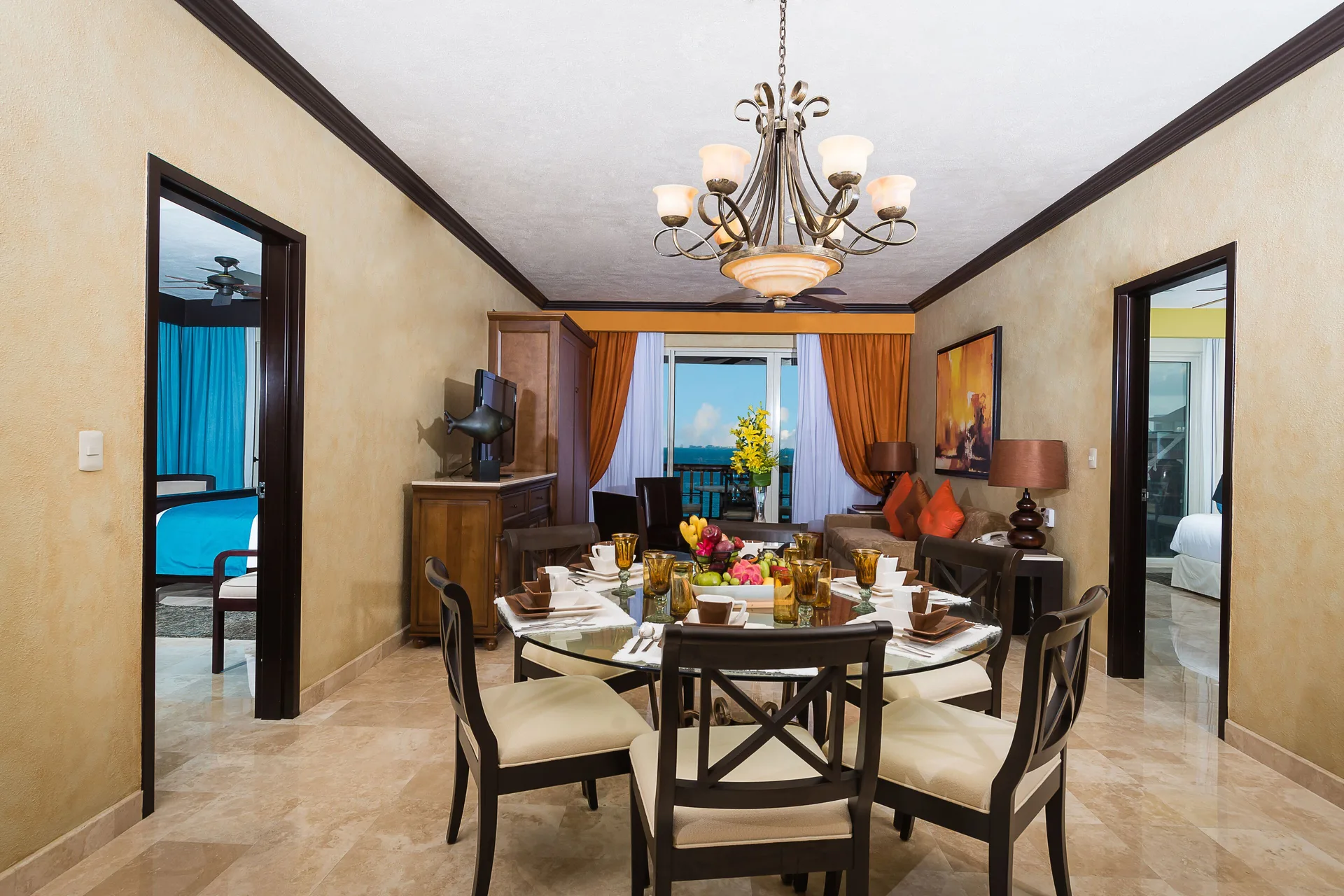Dining and living area in the Two Bedroom Penthouse at Villa del Palmar Cancun Beach Resort & Spa.