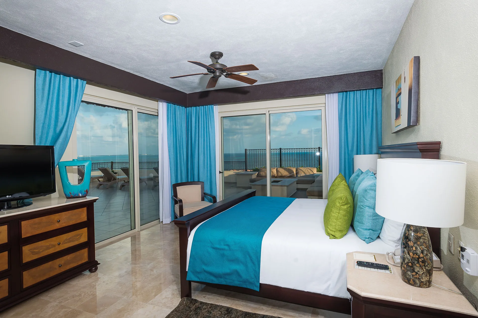 Ocean-view bedroom in the Two Bedroom Penthouse at Villa del Palmar Cancun Beach Resort & Spa.